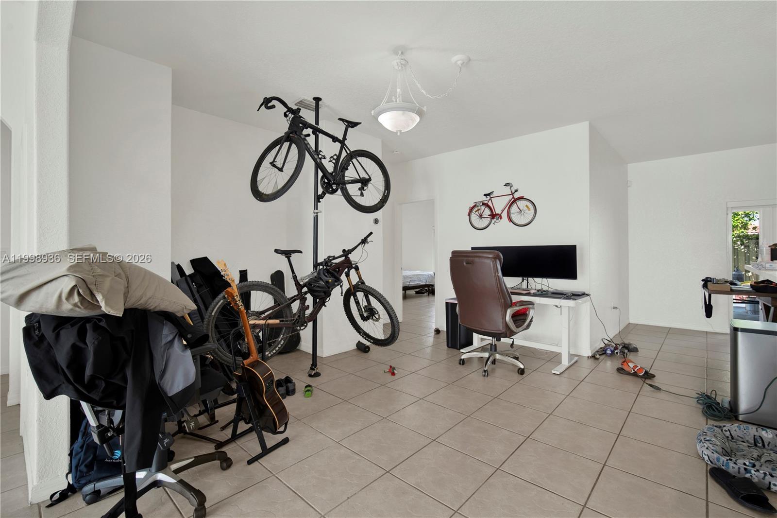 5510 Southwest 161st Place Miami, FL 33185 - Photo 5 of 28 a view of a room with gym equipment