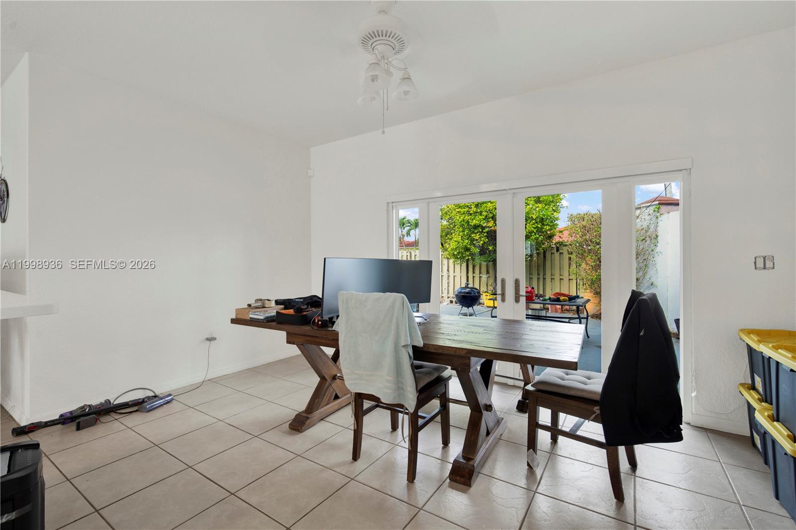 5510 Southwest 161st Place Miami, FL 33185 - Photo 7 of 28 a view of a dining room with furniture window and outside view