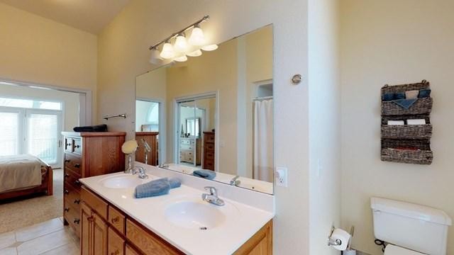 571 Mallard Pointe Road Byrdstown, TN 38549 - Photo 29 of 34 a bathroom with a sink a light fixture and a mirror