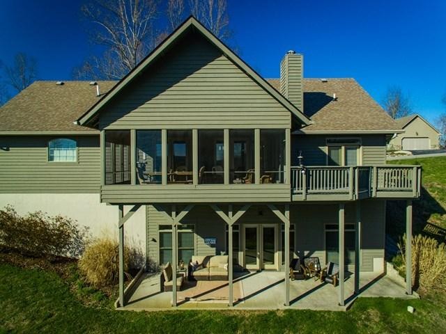 571 Mallard Pointe Road Byrdstown, TN 38549 - Photo 7 of 34 a front view of a house with a porch