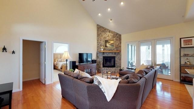 571 Mallard Pointe Road Byrdstown, TN 38549 - Photo 8 of 34 a living room with furniture fireplace and a table