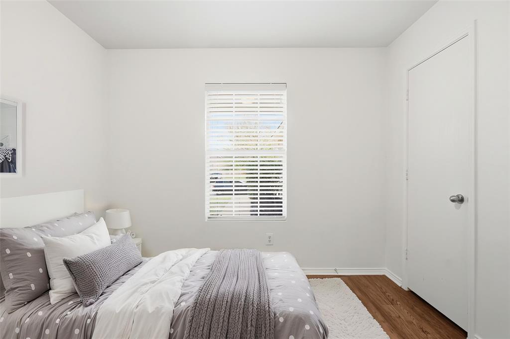 4005 Freedom Street Forney, TX 75126 - Photo 7 of 40 a bedroom with a bed and a window