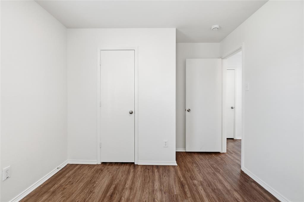 4005 Freedom Street Forney, TX 75126 - Photo 10 of 40 a view of a room with wooden floor