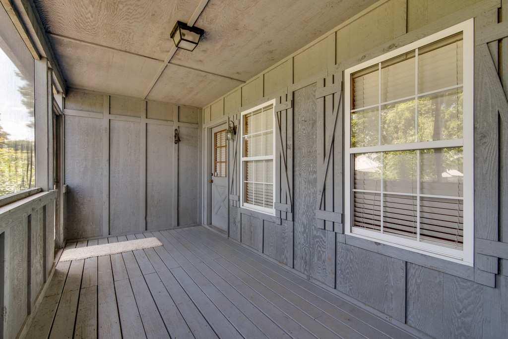 4845 Starks Road Cross Plains, TN 37049 - Photo 18 of 30 a view of a bathroom with wooden floor and windows
