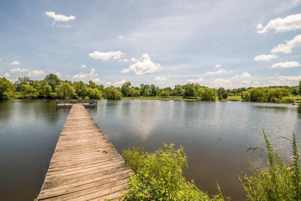 4845 Starks Road Cross Plains, TN 37049 - Photo 2 of 30 a wooden pier with boats in a lake