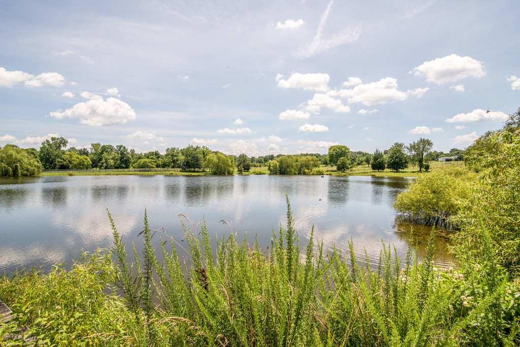 4845 Starks Road Cross Plains, TN 37049 - Photo 30 of 30 a view of a lake with houses in the back