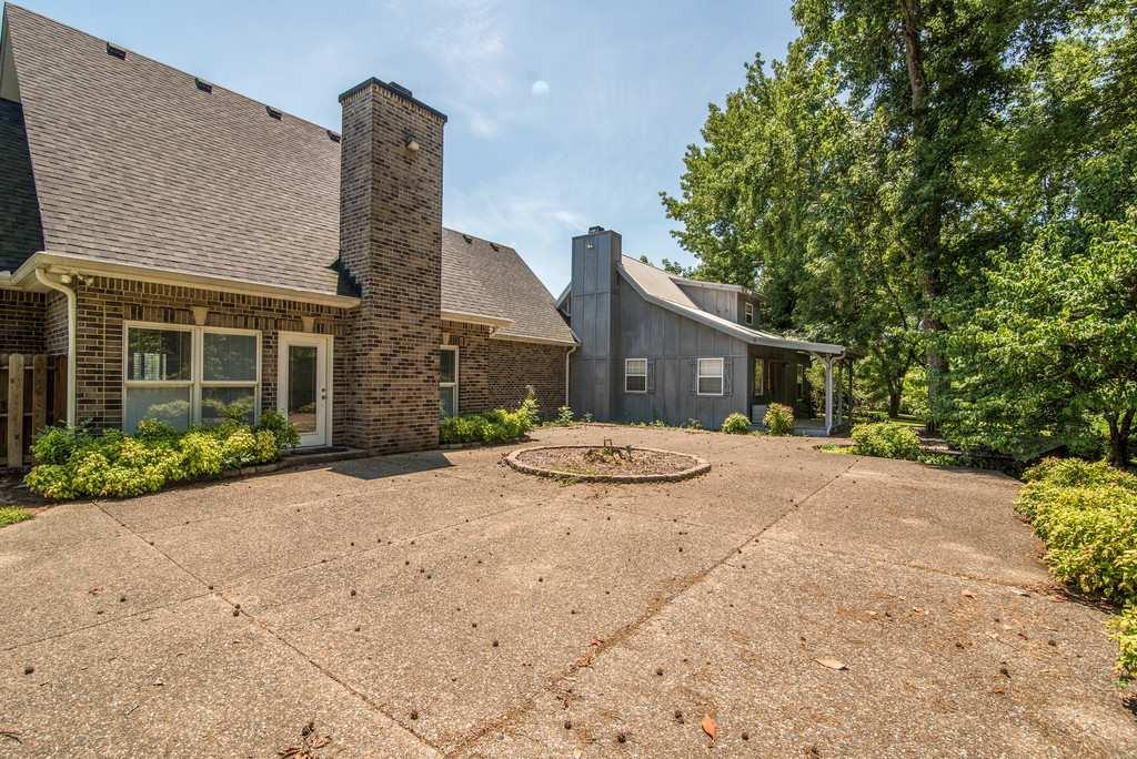 4845 Starks Road Cross Plains, TN 37049 - Photo 6 of 30 a front view of house with yard and trees around