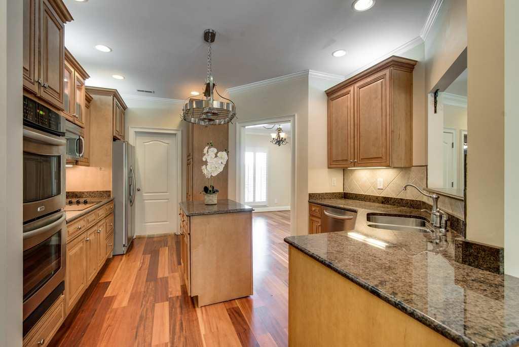 4845 Starks Road Cross Plains, TN 37049 - Photo 9 of 30 a kitchen with granite countertop a sink stove and refrigerator