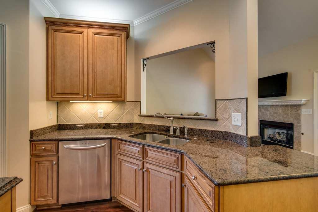 4845 Starks Road Cross Plains, TN 37049 - Photo 10 of 30 a kitchen with granite countertop a sink and a stove