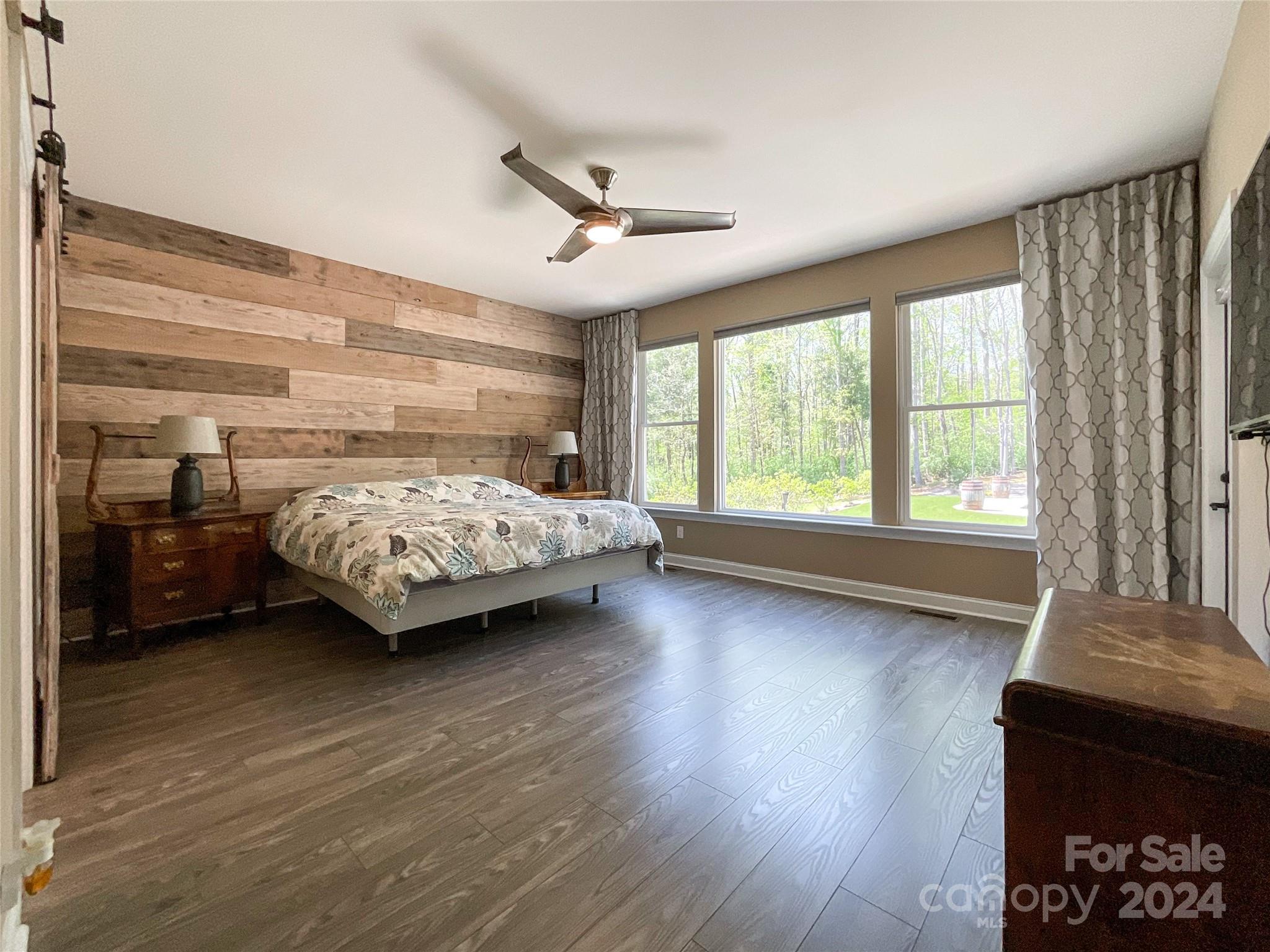 9408 Deer Run Road Waxhaw, NC 28173 - Photo 18 of 47 a bedroom with a bed and a window