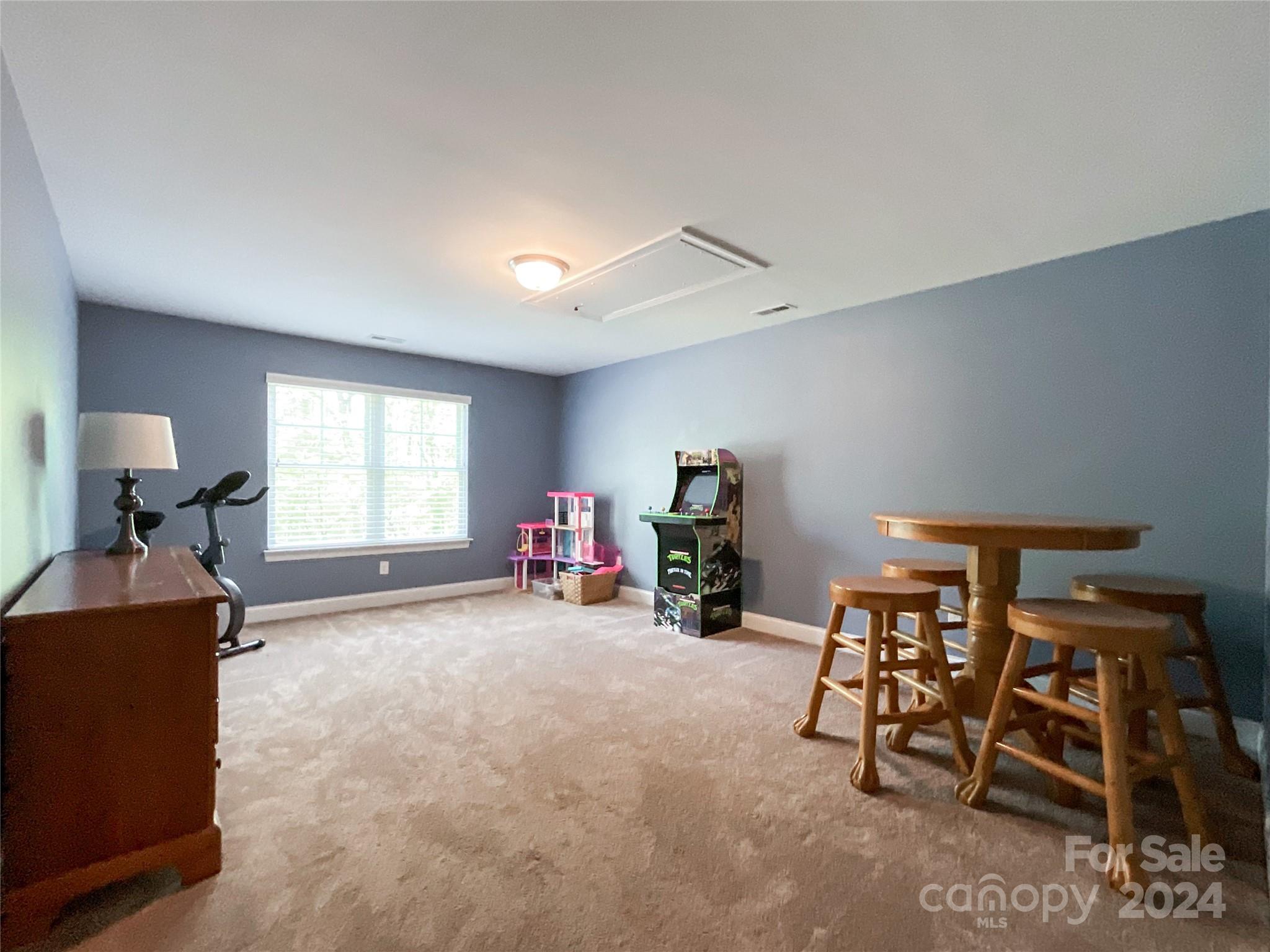 9408 Deer Run Road Waxhaw, NC 28173 - Photo 36 of 47 a livingroom with furniture and a window