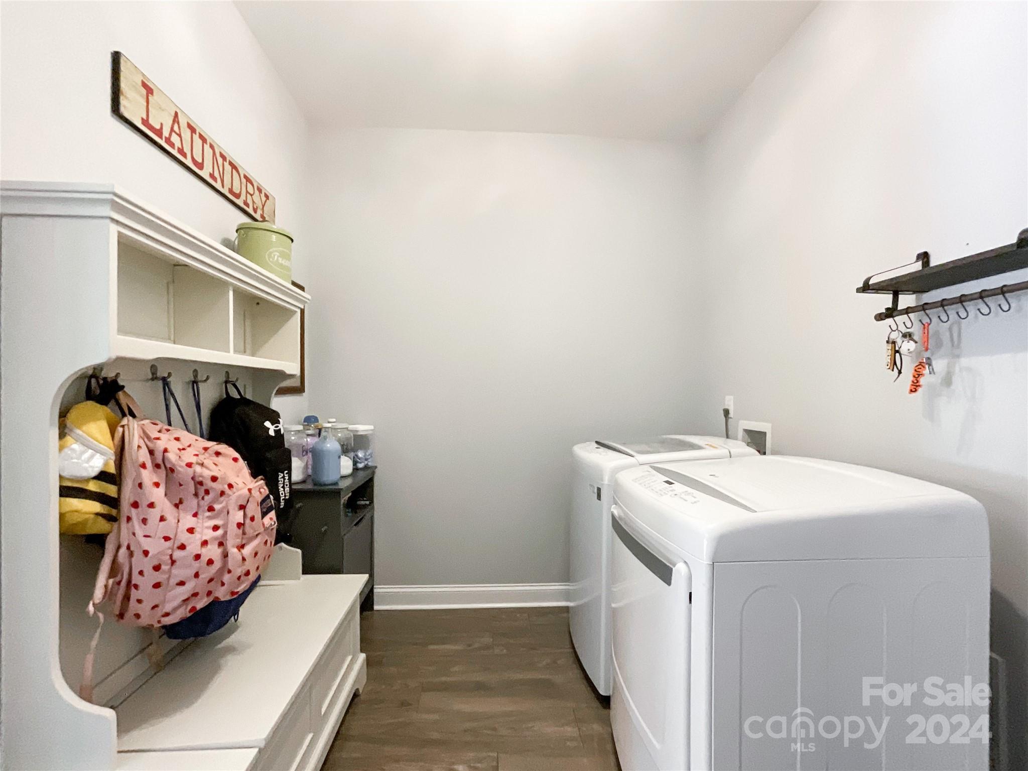 9408 Deer Run Road Waxhaw, NC 28173 - Photo 37 of 47 a utility room with dryer and washer
