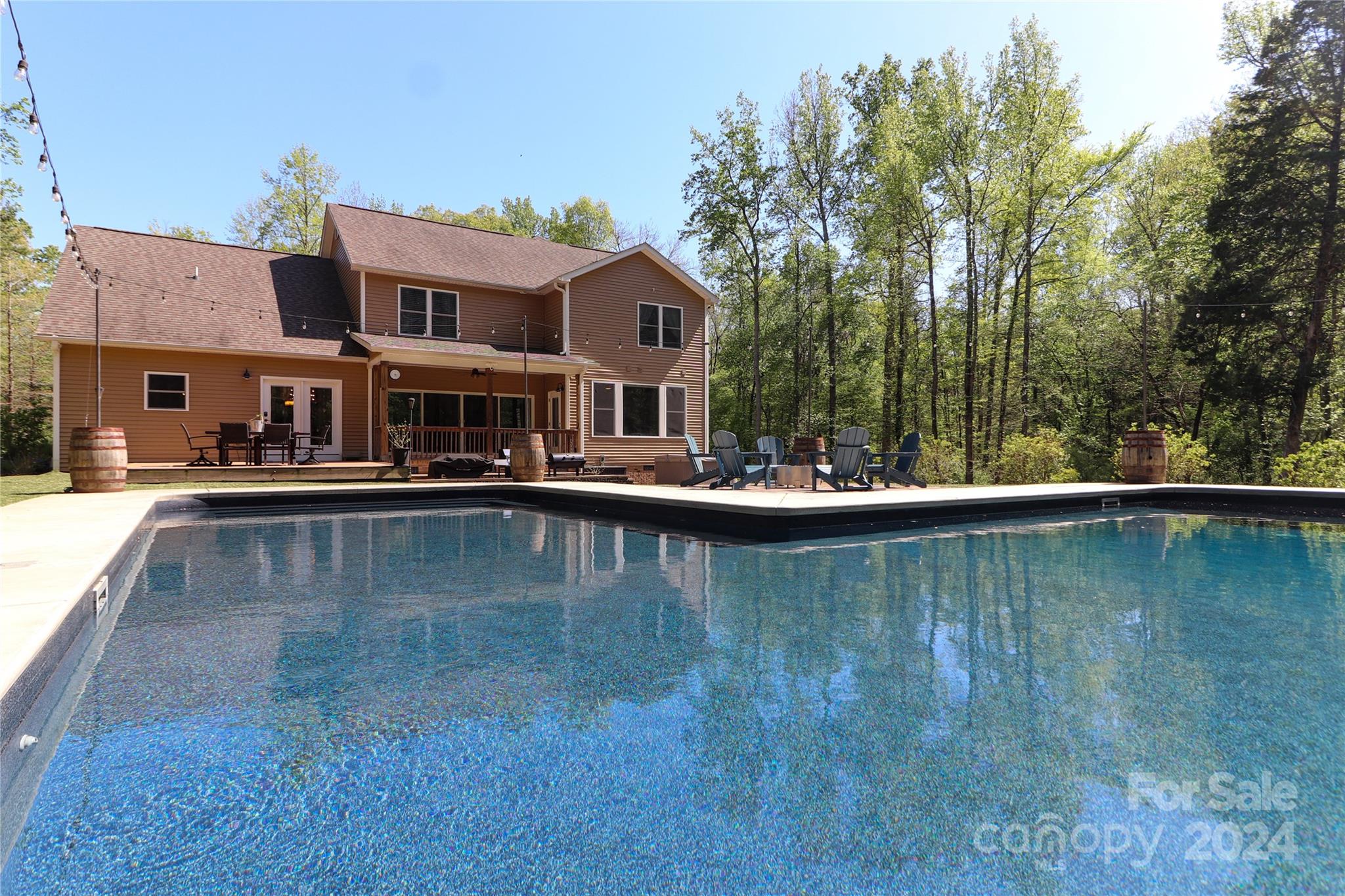 9408 Deer Run Road Waxhaw, NC 28173 - Photo 39 of 47 a view of a swimming pool is middle in the backyard