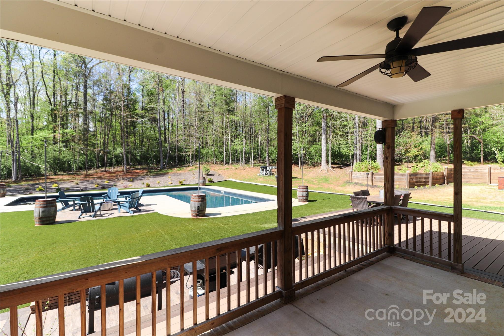 9408 Deer Run Road Waxhaw, NC 28173 - Photo 41 of 47 a view of a porch and garden
