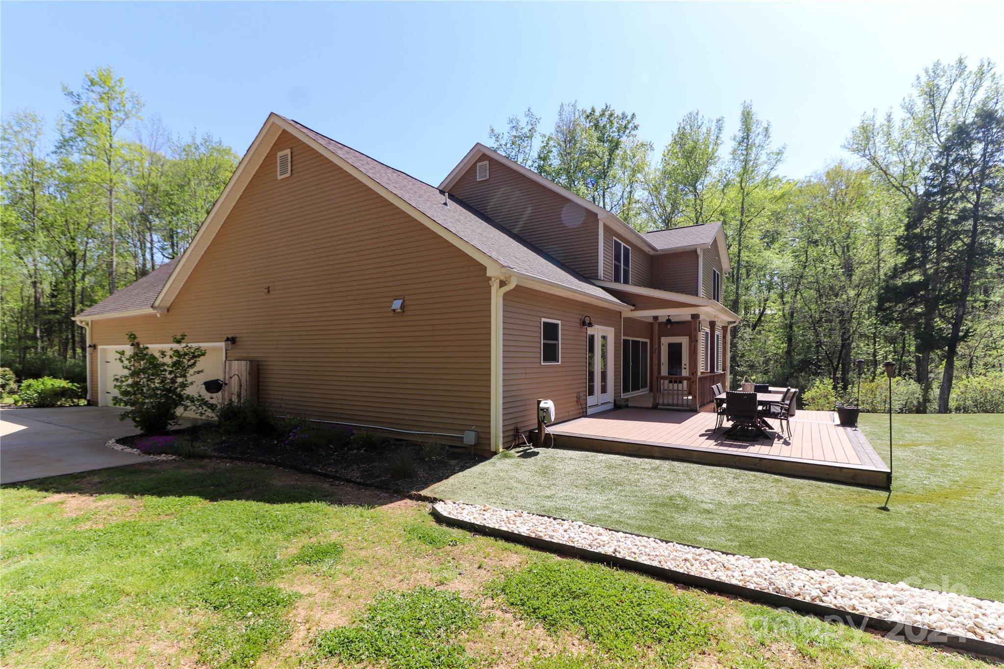9408 Deer Run Road Waxhaw, NC 28173 - Photo 42 of 47 a front view of house with yard and trees