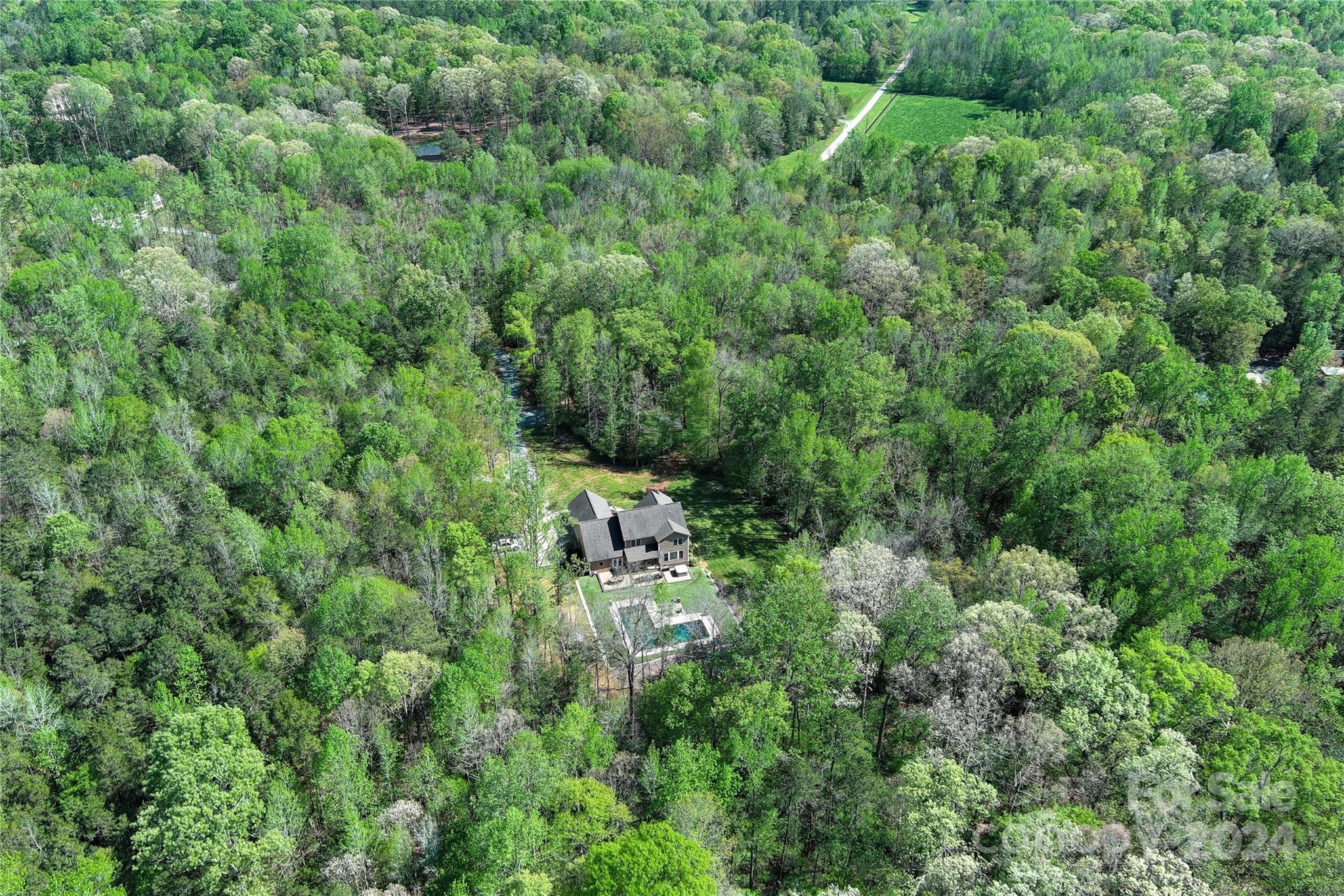 9408 Deer Run Road Waxhaw, NC 28173 - Photo 45 of 47 an aerial view of residential house with outdoor space and trees all around