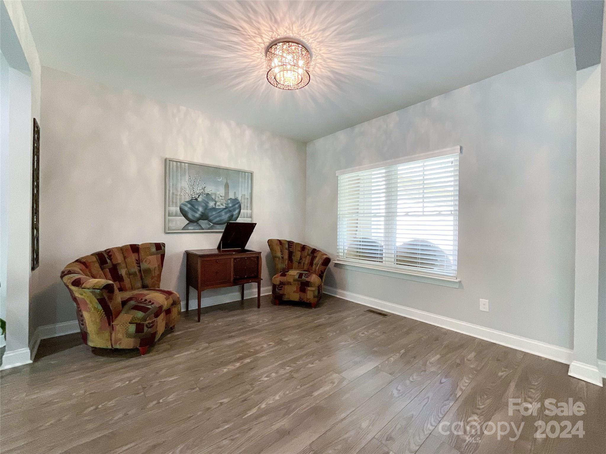 9408 Deer Run Road Waxhaw, NC 28173 - Photo 6 of 47 a living room with furniture and a window