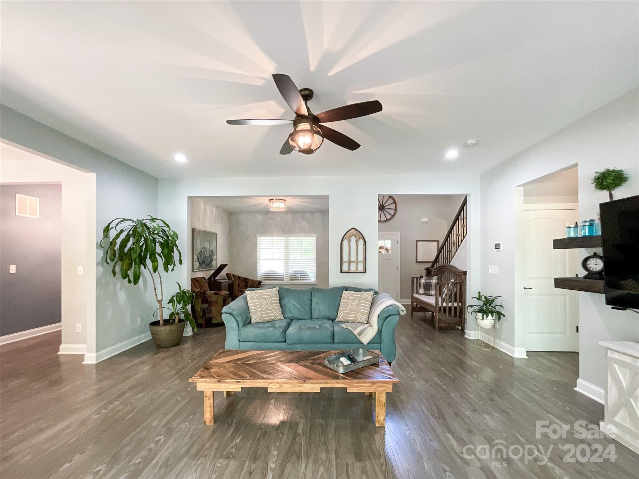9408 Deer Run Road Waxhaw, NC 28173 - Photo 8 of 47 a living room with furniture and a large window