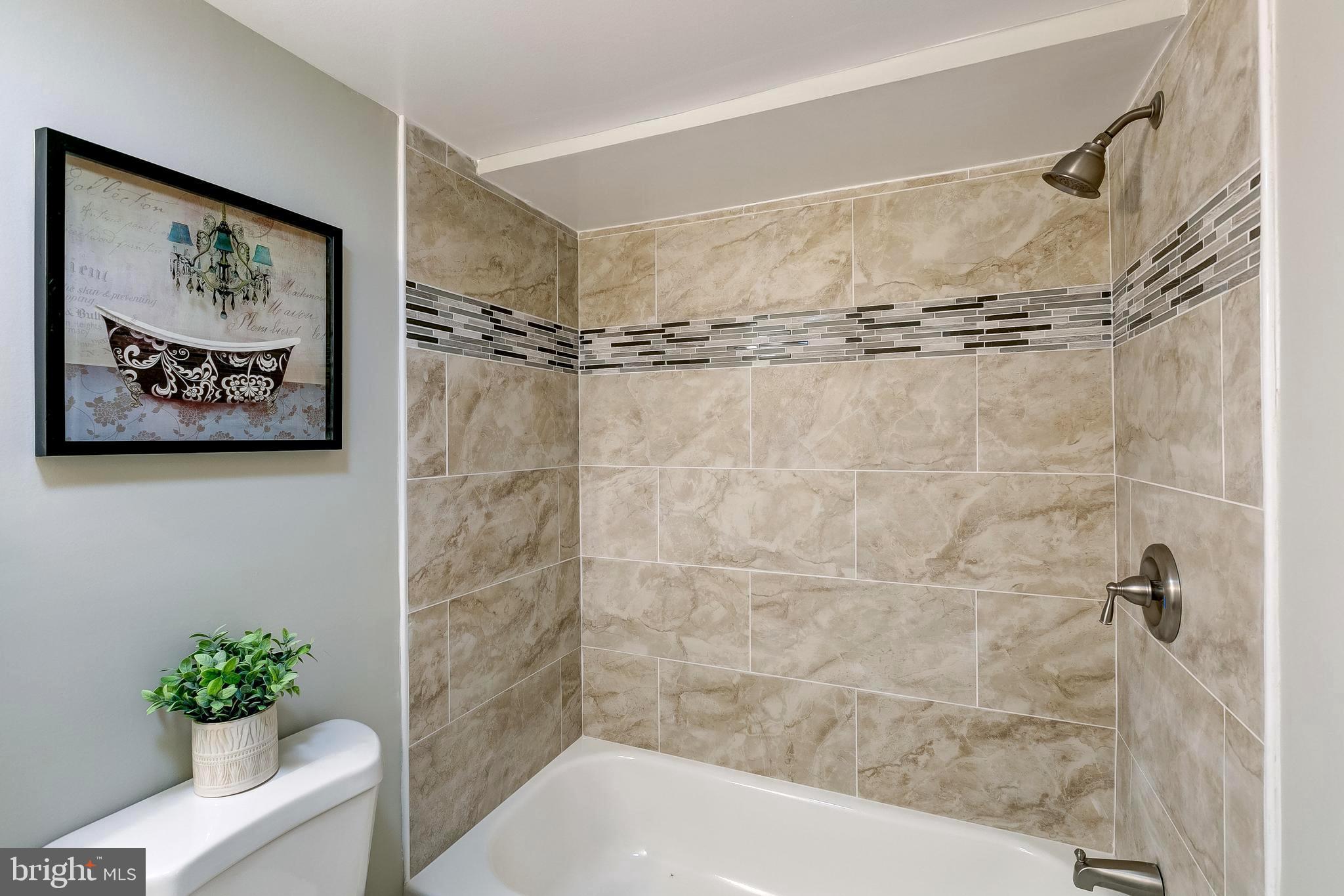 1307 Kitmore Road Baltimore, MD 21239 - Photo 12 of 28 Full bath in the basement!