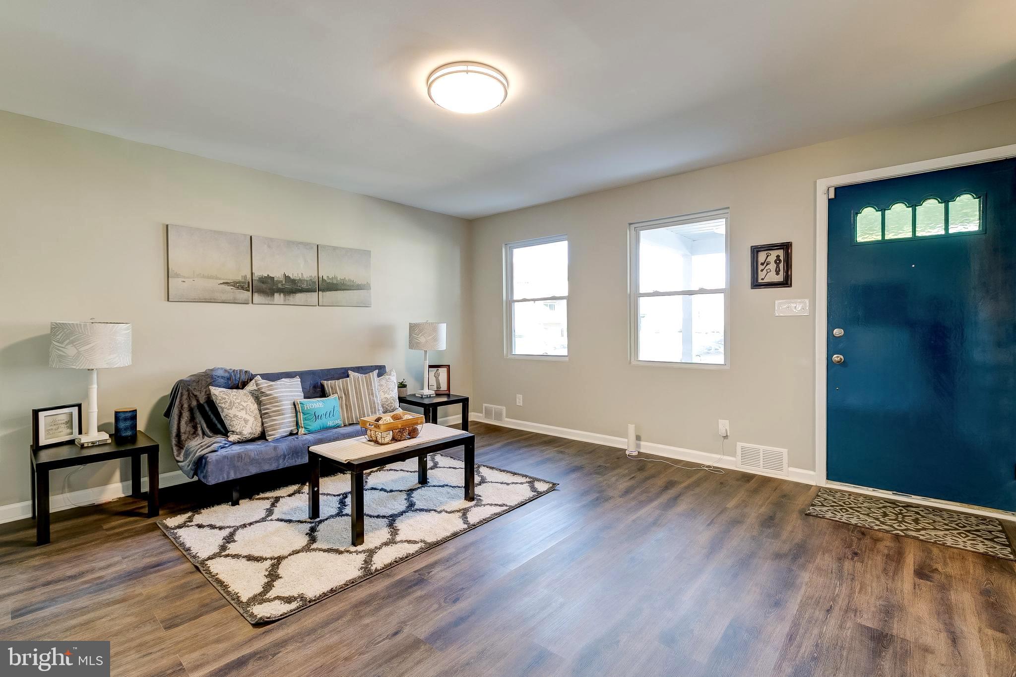 1307 Kitmore Road Baltimore, MD 21239 - Photo 3 of 28 Comfortable living room with new LVP flooring