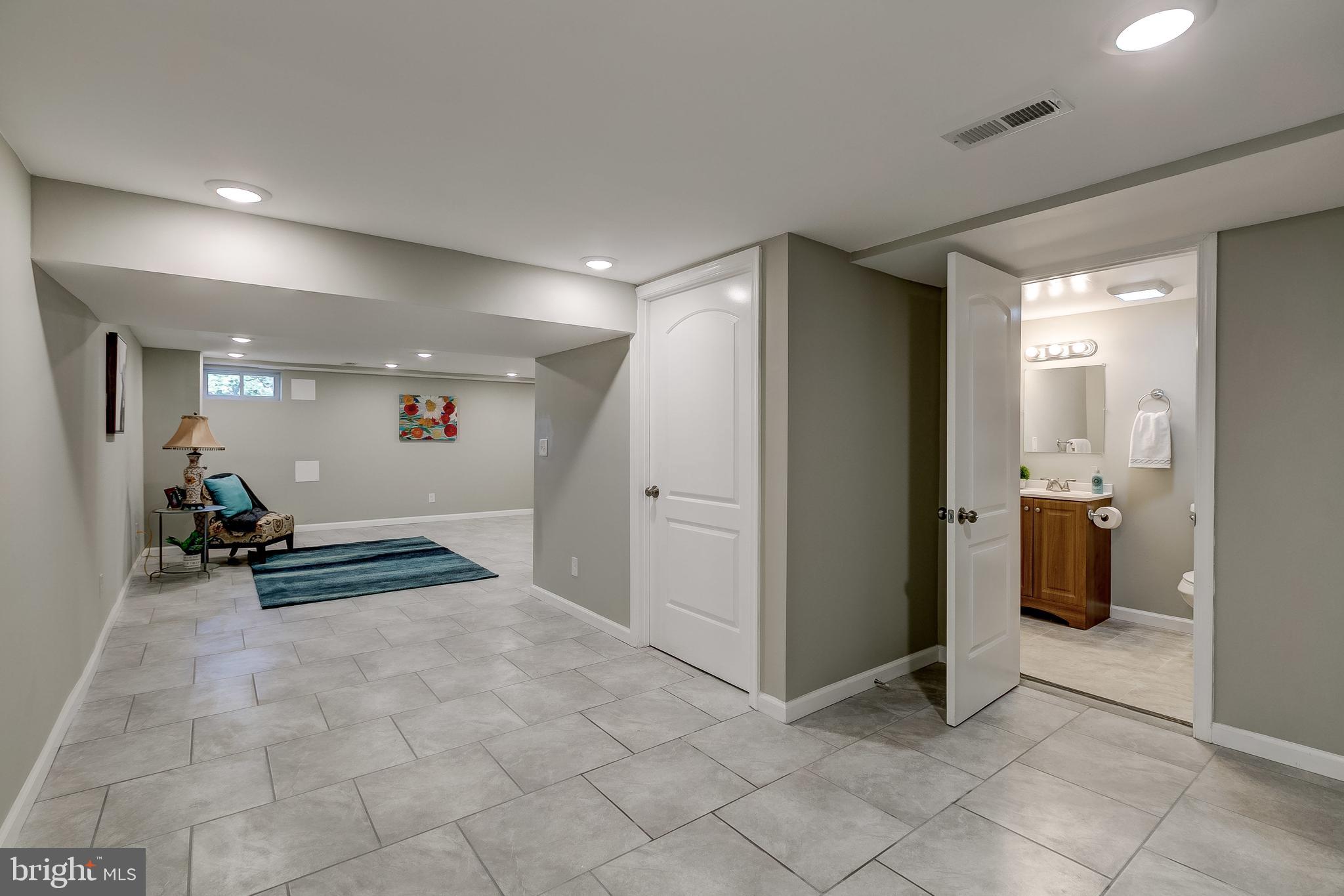 1307 Kitmore Road Baltimore, MD 21239 - Photo 26 of 28 Access to mechanical room & laundry hook ups