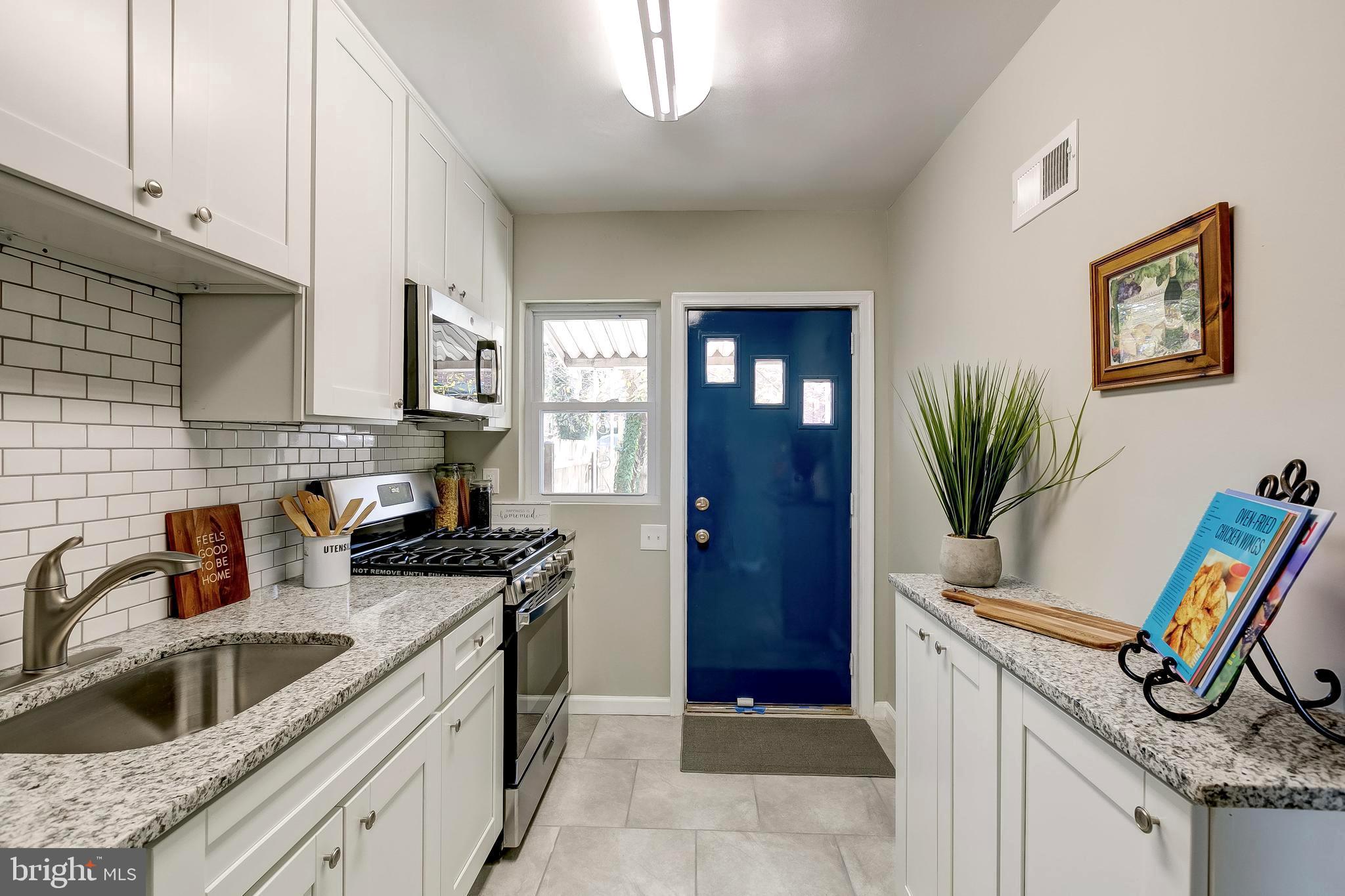 1307 Kitmore Road Baltimore, MD 21239 - Photo 7 of 28 Gorgeous Kitchen! White cabinetry, granite counter
