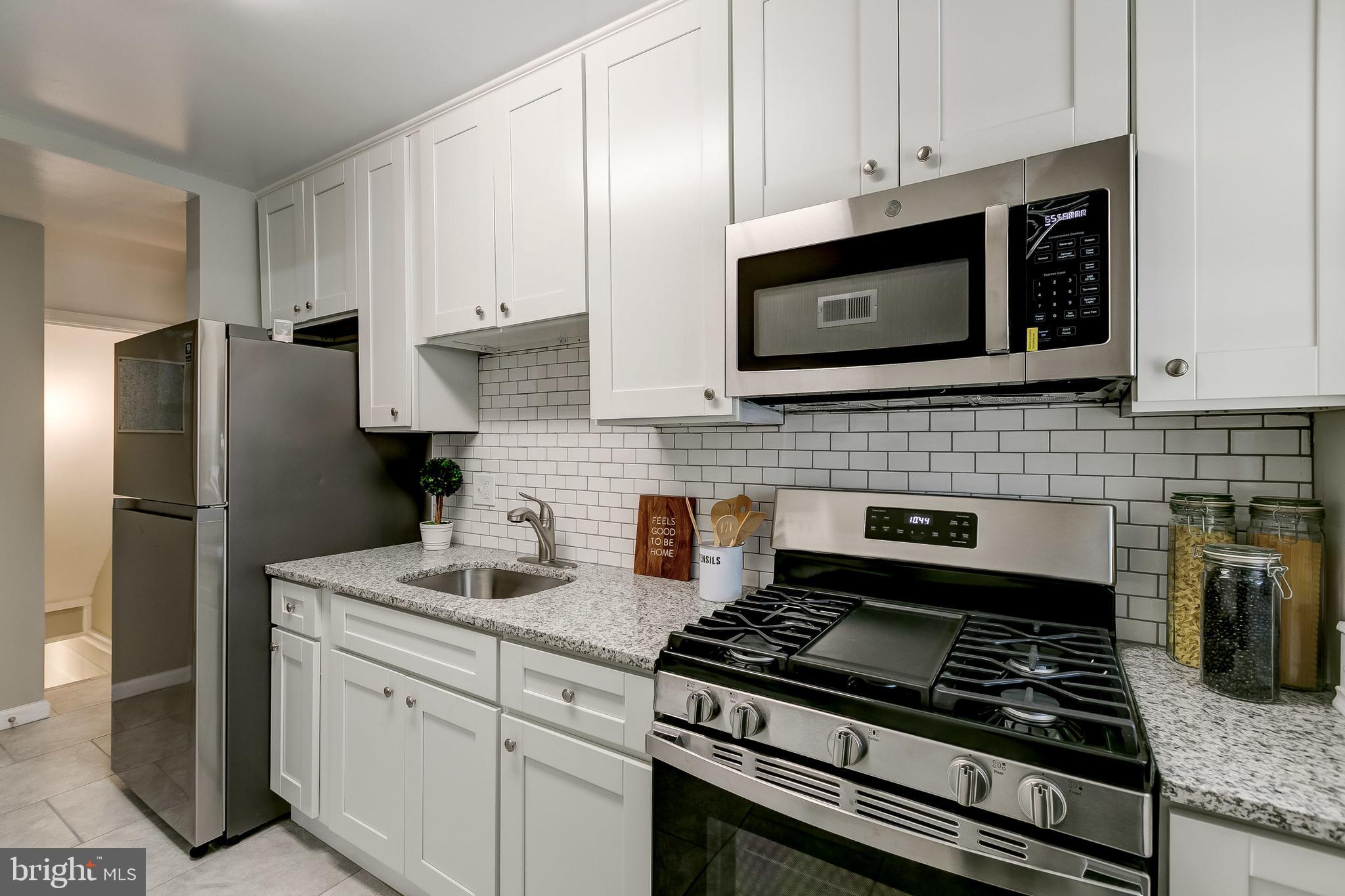 1307 Kitmore Road Baltimore, MD 21239 - Photo 8 of 28 Stainless appliance suite, gorgeous backsplash!