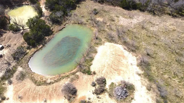 a view of a yard covered in snow