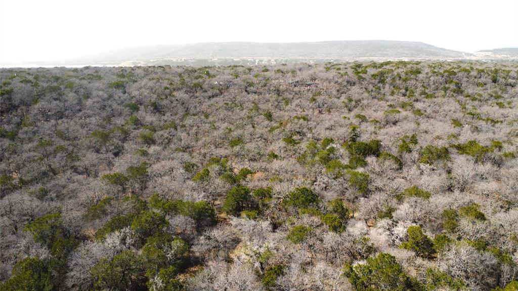7789 White Tail Ridge Gordon, TX 76453 - Photo 18 of 34 a view of a city with lush green forest