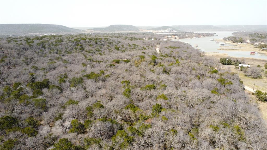 7789 White Tail Ridge Gordon, TX 76453 - Photo 20 of 34 a view of an ocean and a mountain