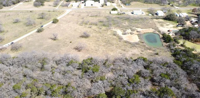 a view of beach and yard