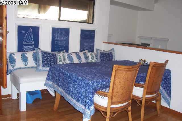 101 Hui Rd F, Unit F KIPA VILLAGE B2 Lahaina, HI 96761 - Photo 3 of 10 a living room with furniture and wooden floor
