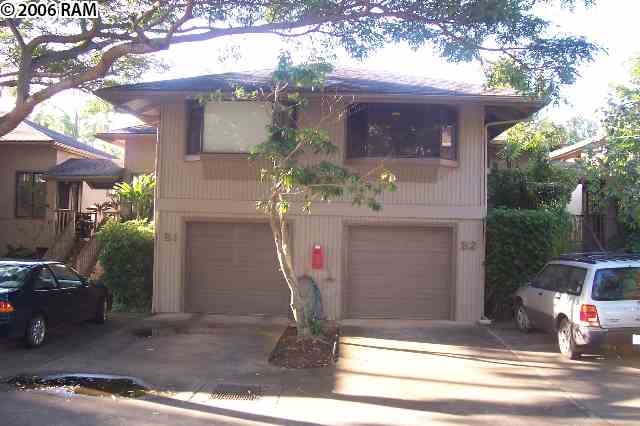 101 Hui Rd F, Unit F KIPA VILLAGE B2 Lahaina, HI 96761 - Photo 10 of 10 a front view of a house with garden
