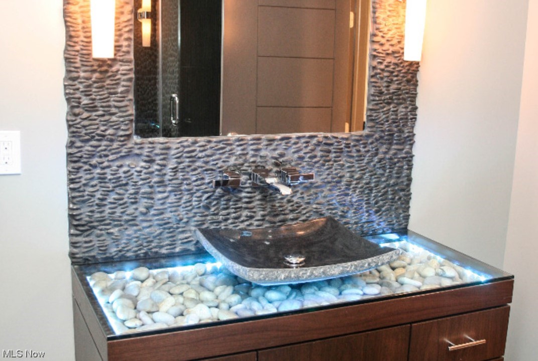 2300 Rivers Edge Drive Willoughby, OH 44094 - Photo 15 of 29 1st flloor bathroom, custom light up counter surface