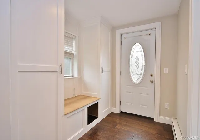 a view of bathroom with washer and dryer