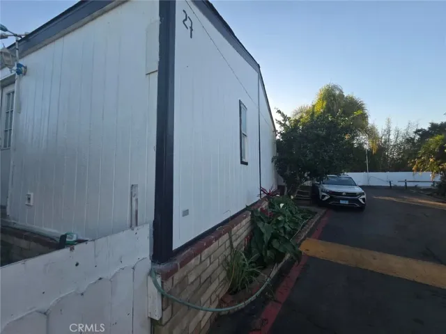 a front view of a house with outdoor space