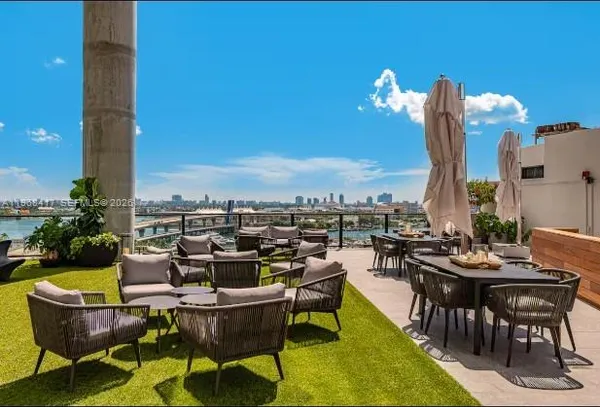 a view of a terrace with furniture