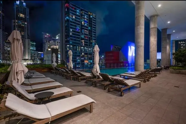 a view of a lake with a yard