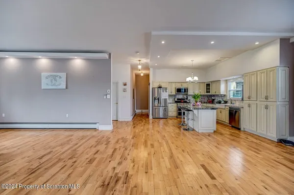 a view of a livingroom with furniture and windows