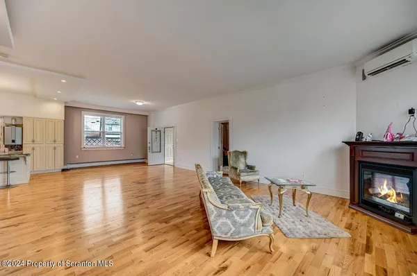 a kitchen with stainless steel appliances a stove top oven