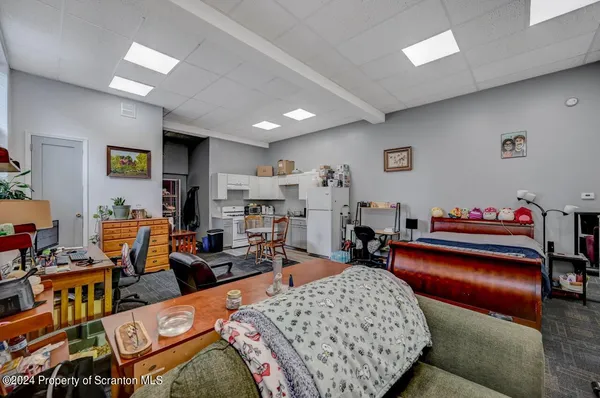 a front view of a house with parking space