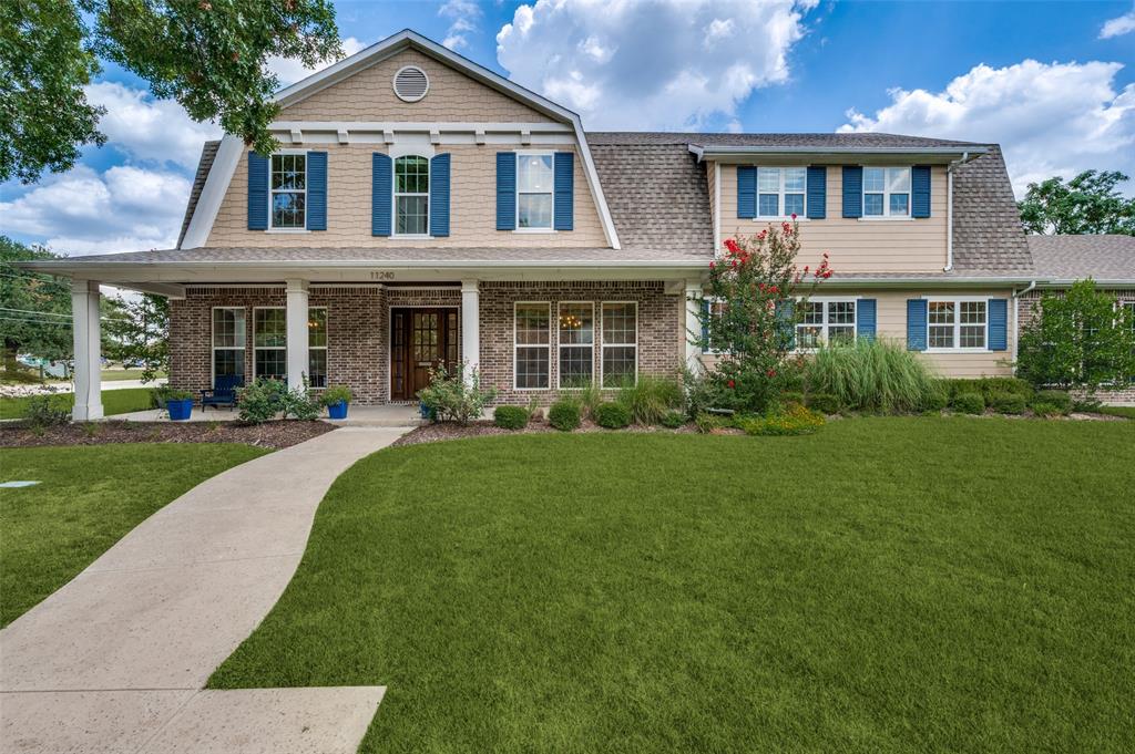 11240 Rosser Road Dallas, TX 75229 - Photo 1 of 18 a front view of a house with a yard