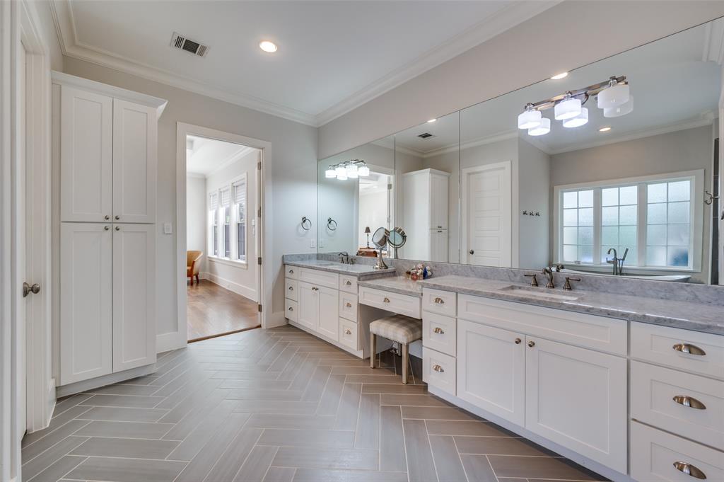 11240 Rosser Road Dallas, TX 75229 - Photo 14 of 18 a large kitchen with granite countertop a large counter top a sink stainless steel appliances and cabinets