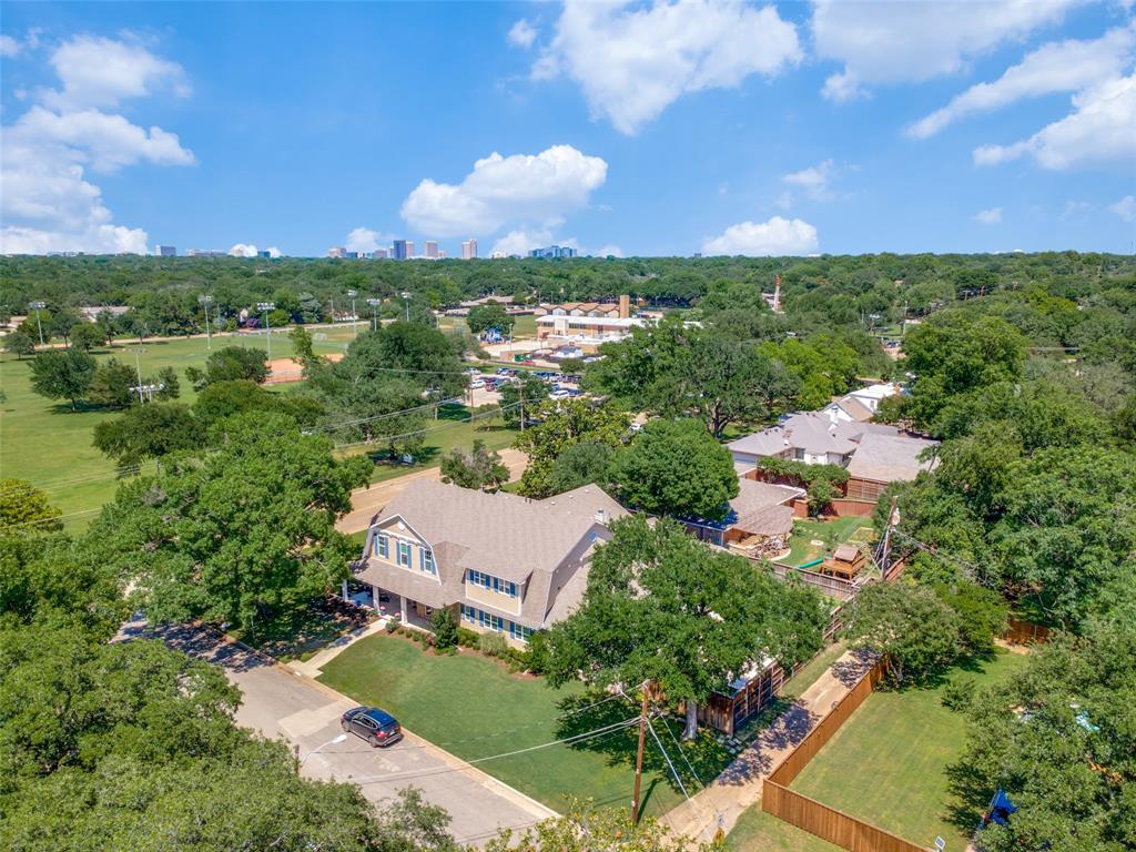 11240 Rosser Road Dallas, TX 75229 - Photo 15 of 18 an aerial view of a house with a garden and lake view