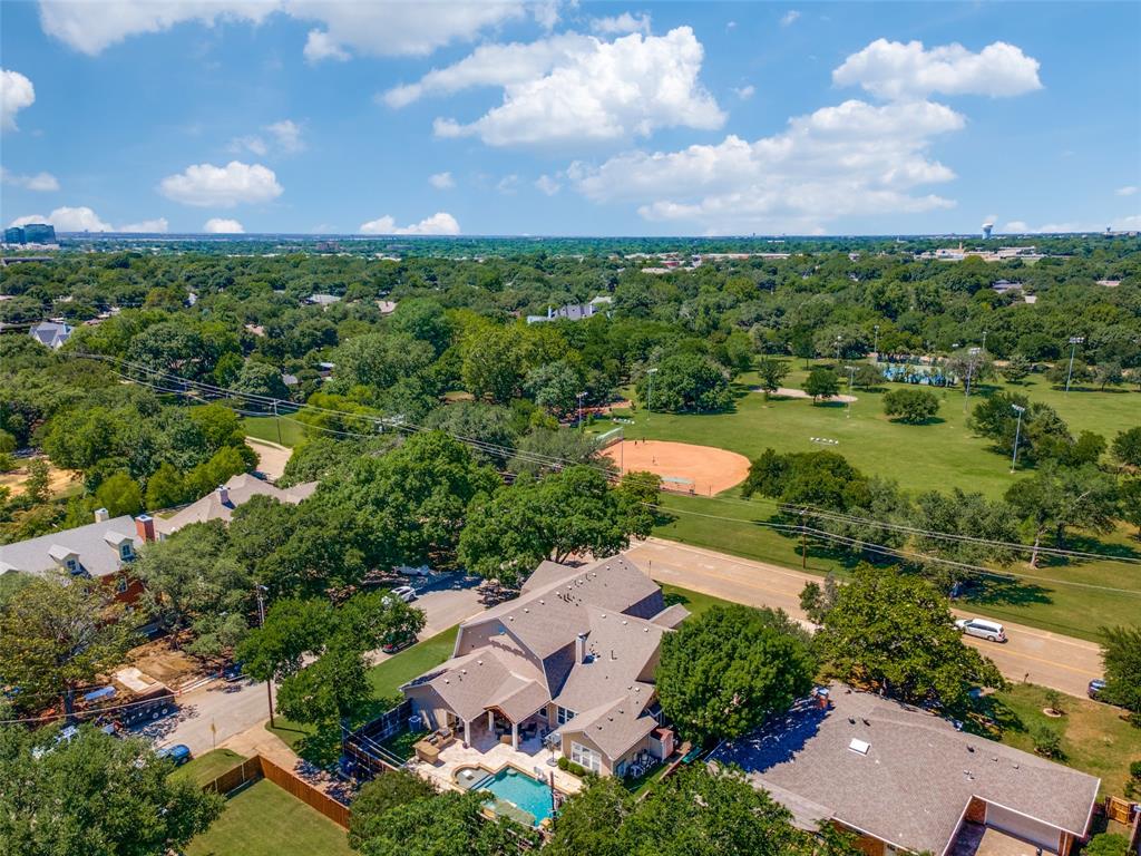 11240 Rosser Road Dallas, TX 75229 - Photo 16 of 18 an aerial view of residential houses with outdoor space and street view