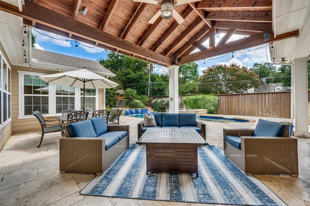 11240 Rosser Road Dallas, TX 75229 - Photo 3 of 18 a balcony with furniture and outdoor view