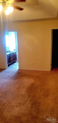 a bathroom with a bathtub and window