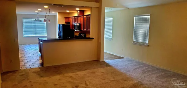a view of a hallway with closet
