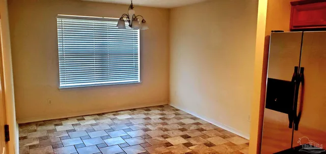 a view of a room with a window