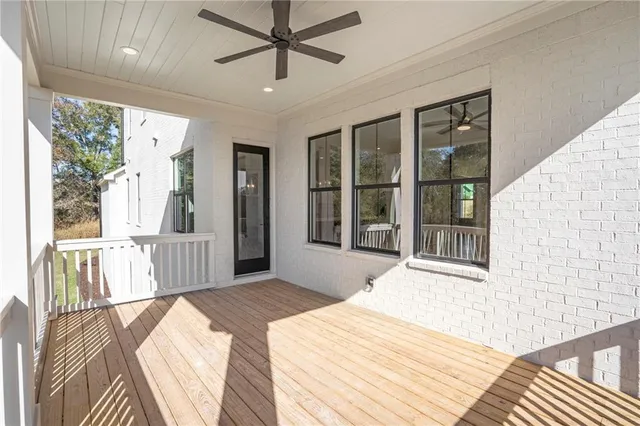 a view of bathroom with a sink and a mirror